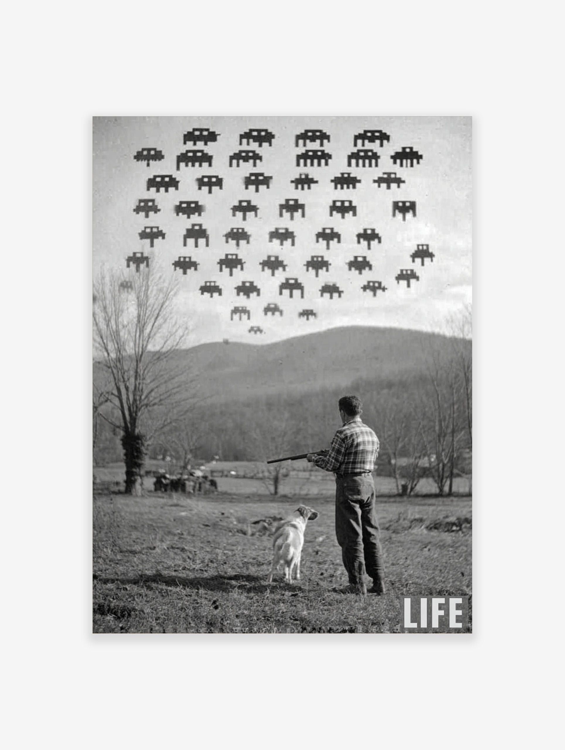 Monochrome print of a man and dog in a field looking up at pixelated Space Invaders in the sky, with 'LIFE' logo