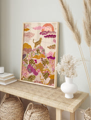 Spotted wild cat on a hill with colourful patterned plants and stylized sun, illustrative art, in an alternate framed mockup