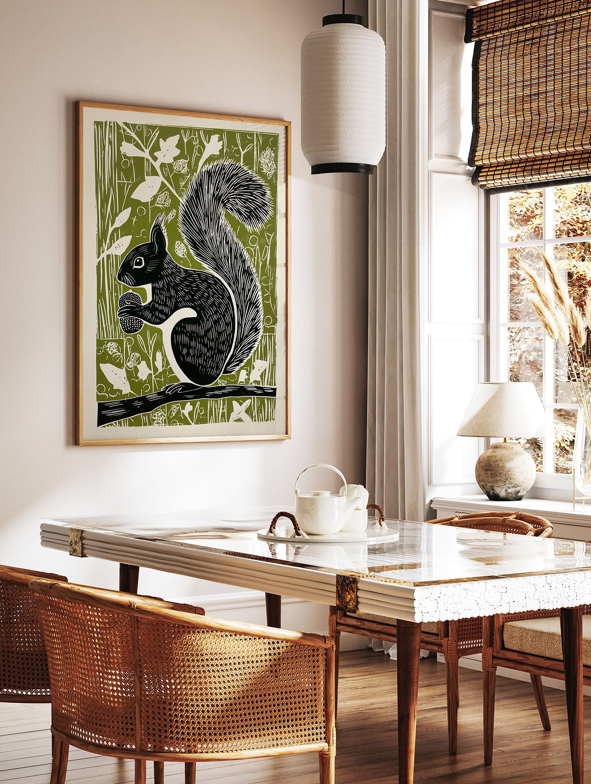 Black squirrel linocut art print on a green background, holding an acorn while sitting on a branch, woodland animal decor. - Image 3