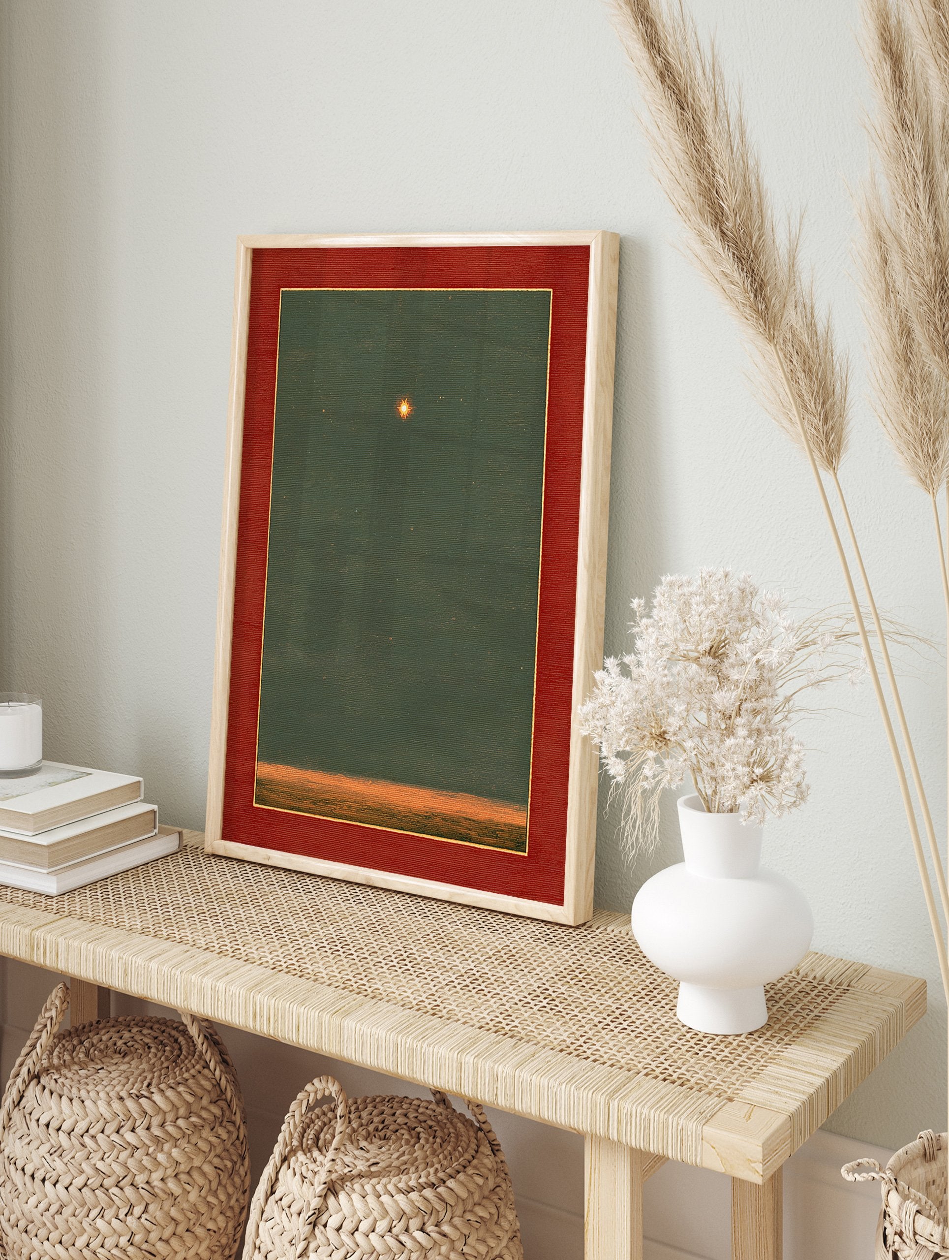 Framed star art print with a glowing star in a dark green sky above an orange horizon, featuring a red mat. - Image 3