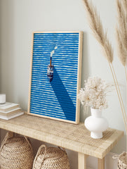 Minimalist steamboat art print on blue and white striped water with a long shadow and smoke from the chimney. - Image 3