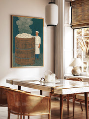 Illustrative print of a chef next to a large wooden steamer barrel overflowing with white steamed, in a styled room mockup