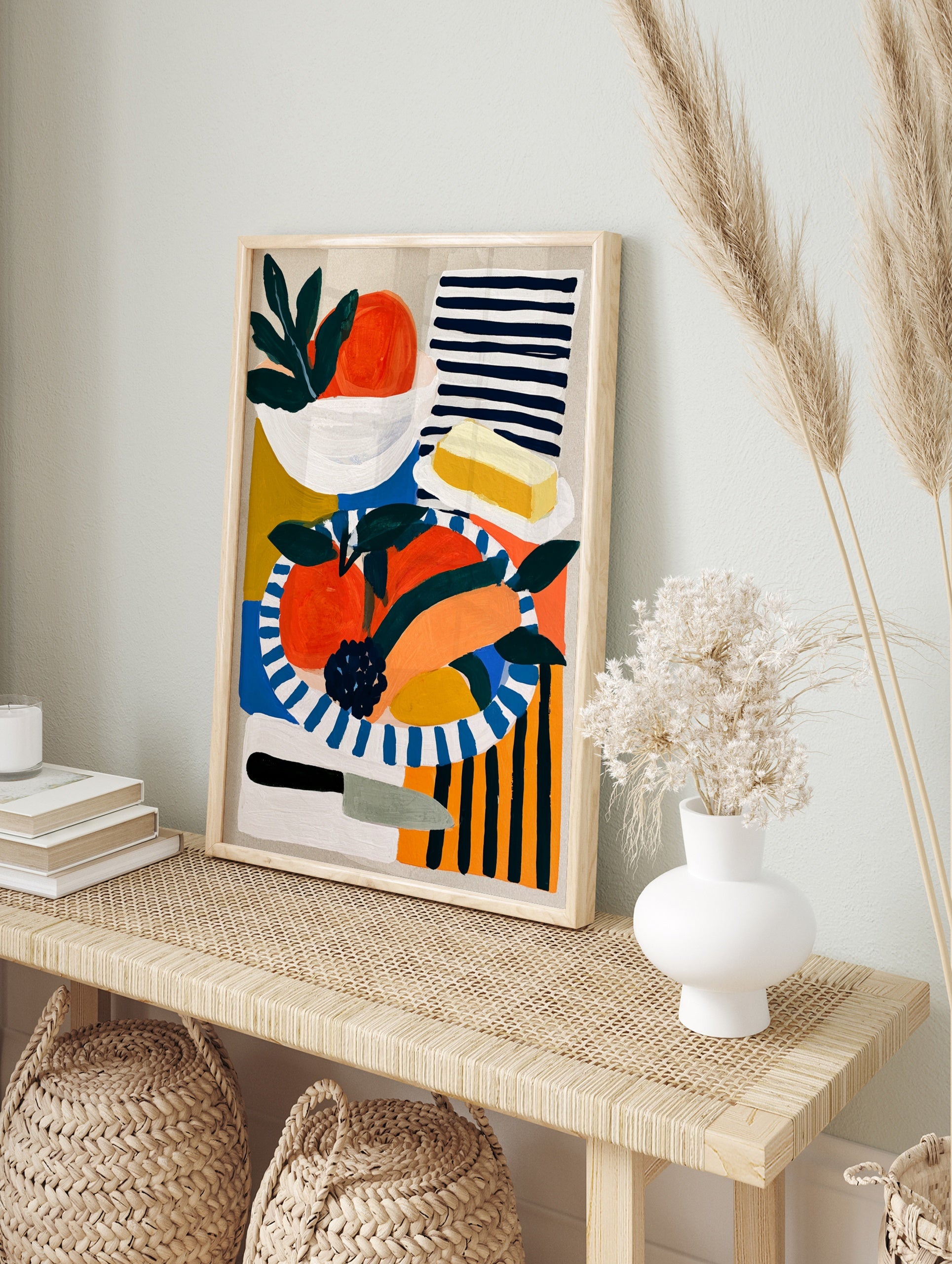 Modern still life illustration of oranges, butter, and a knife on a striped background, in an alternate framed mockup