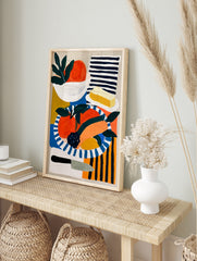 Modern still life illustration of oranges, butter, and a knife on a striped background, in an alternate framed mockup