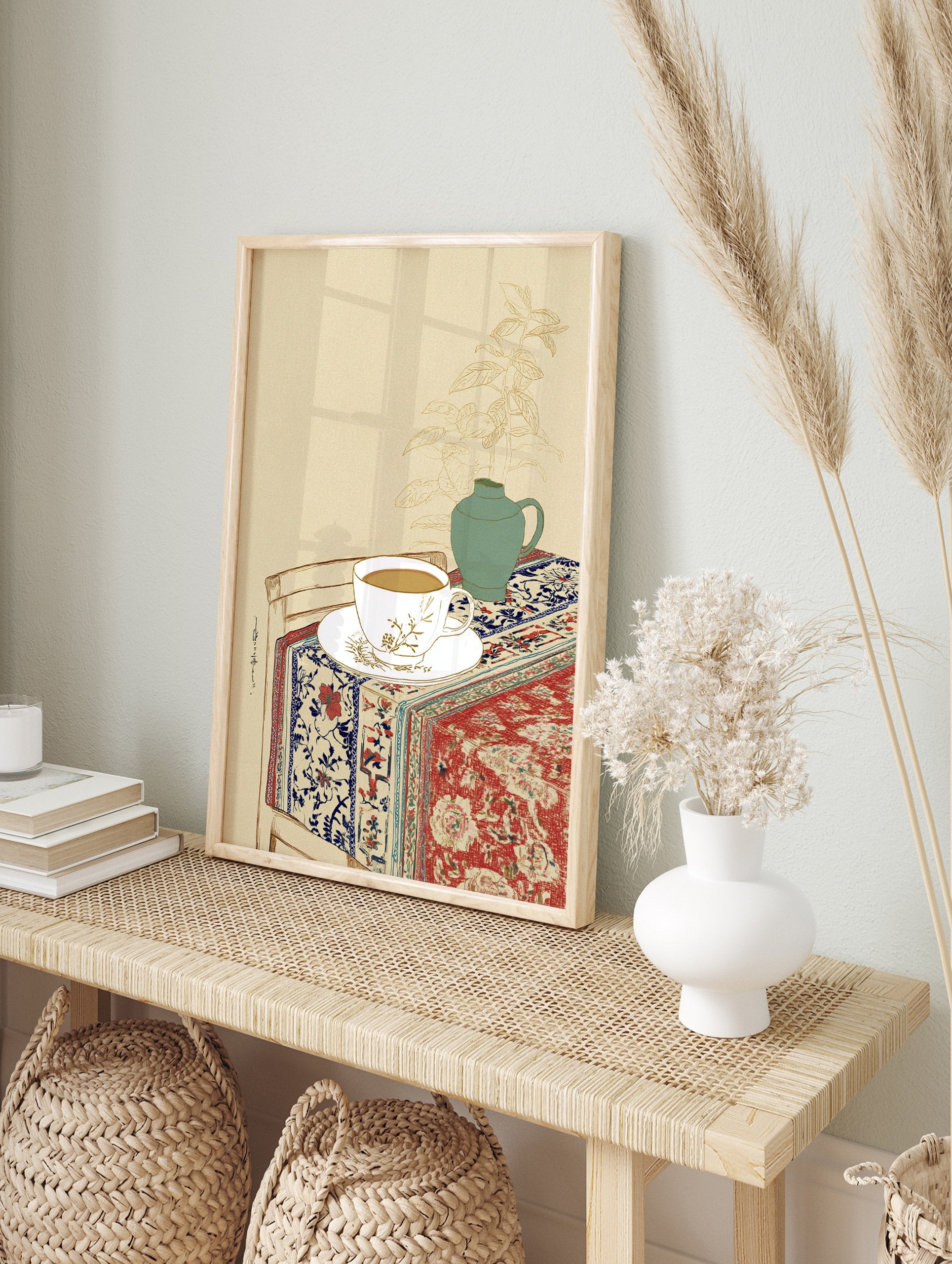 Still life wall art illustration of a tea cup, green vase with plant, and patterned red and blue textile on a table. - Image 3
