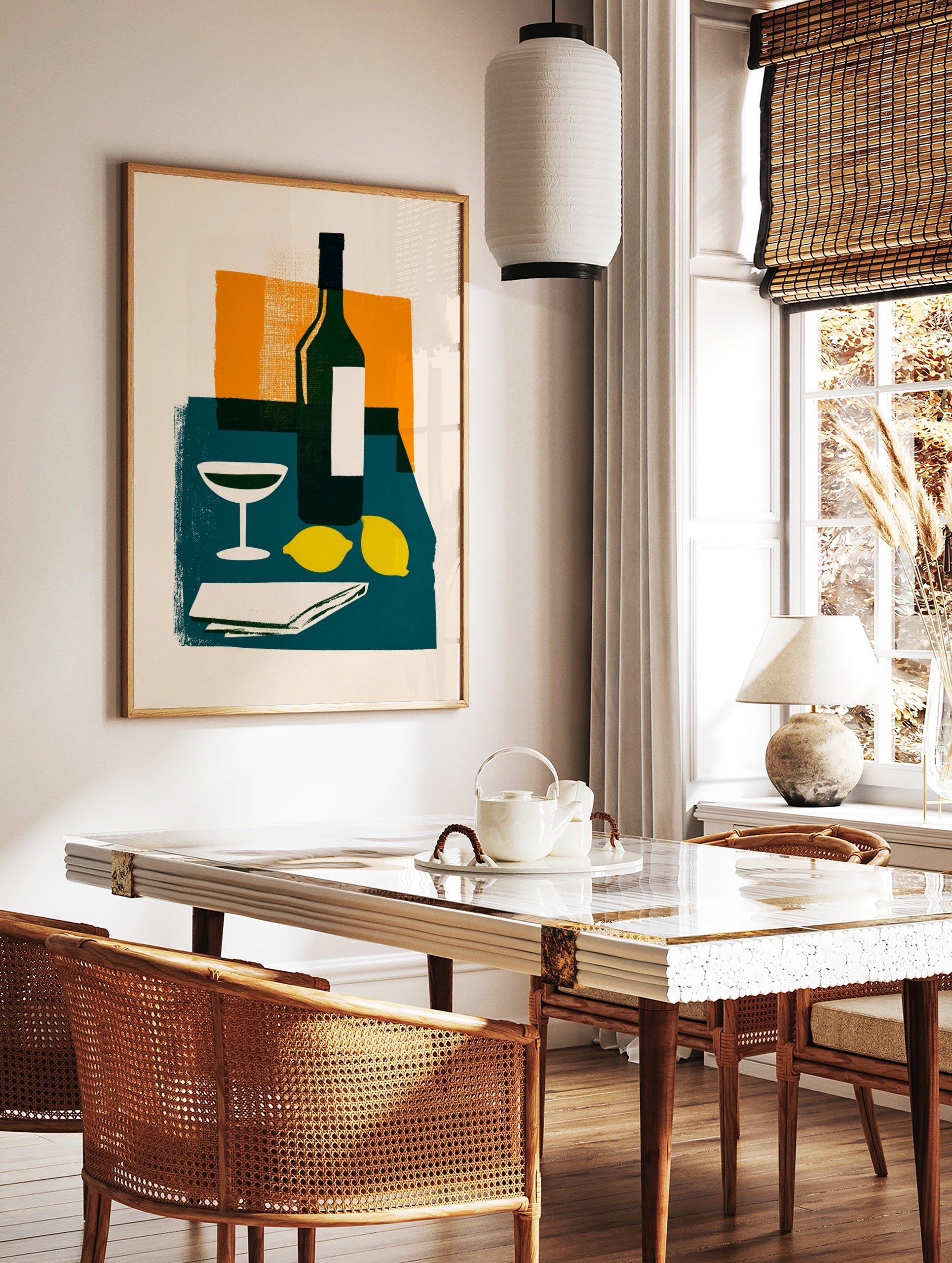 Modern still life wall art with wine bottle, cocktail glass, and lemons on a teal table against an, in a styled room mockup