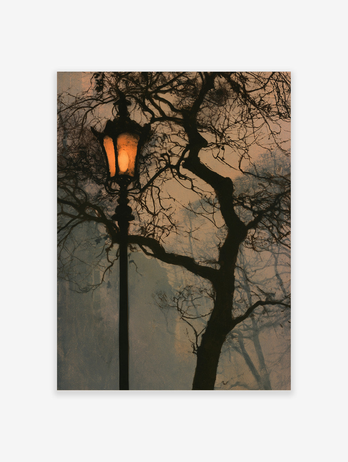 Street lamp at night with glowing light and dark tree branches against a muted sky
