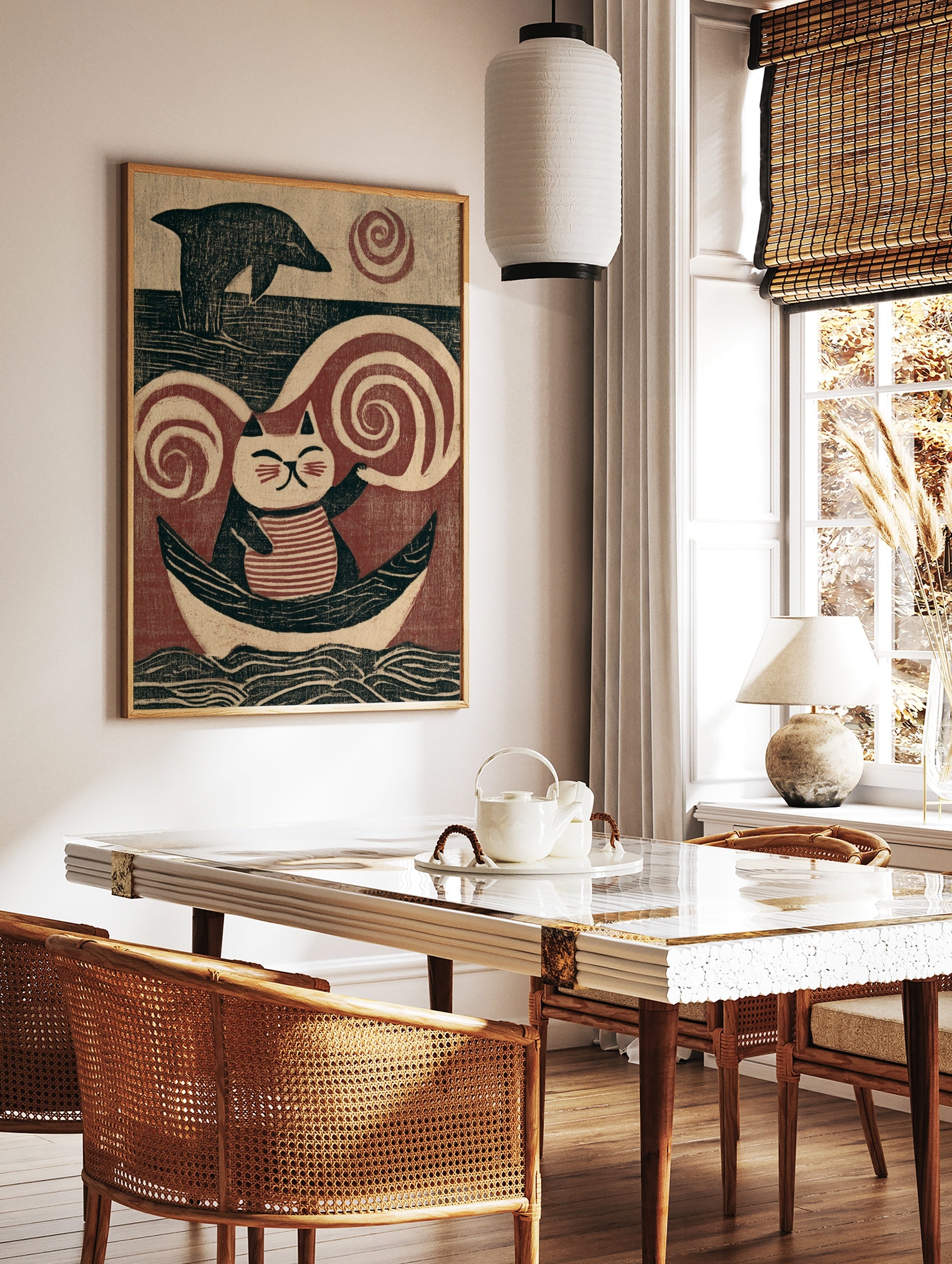 Illustrative art print of a striped cat sitting in a boat with a dolphin and swirling wind, in red, in a styled room mockup