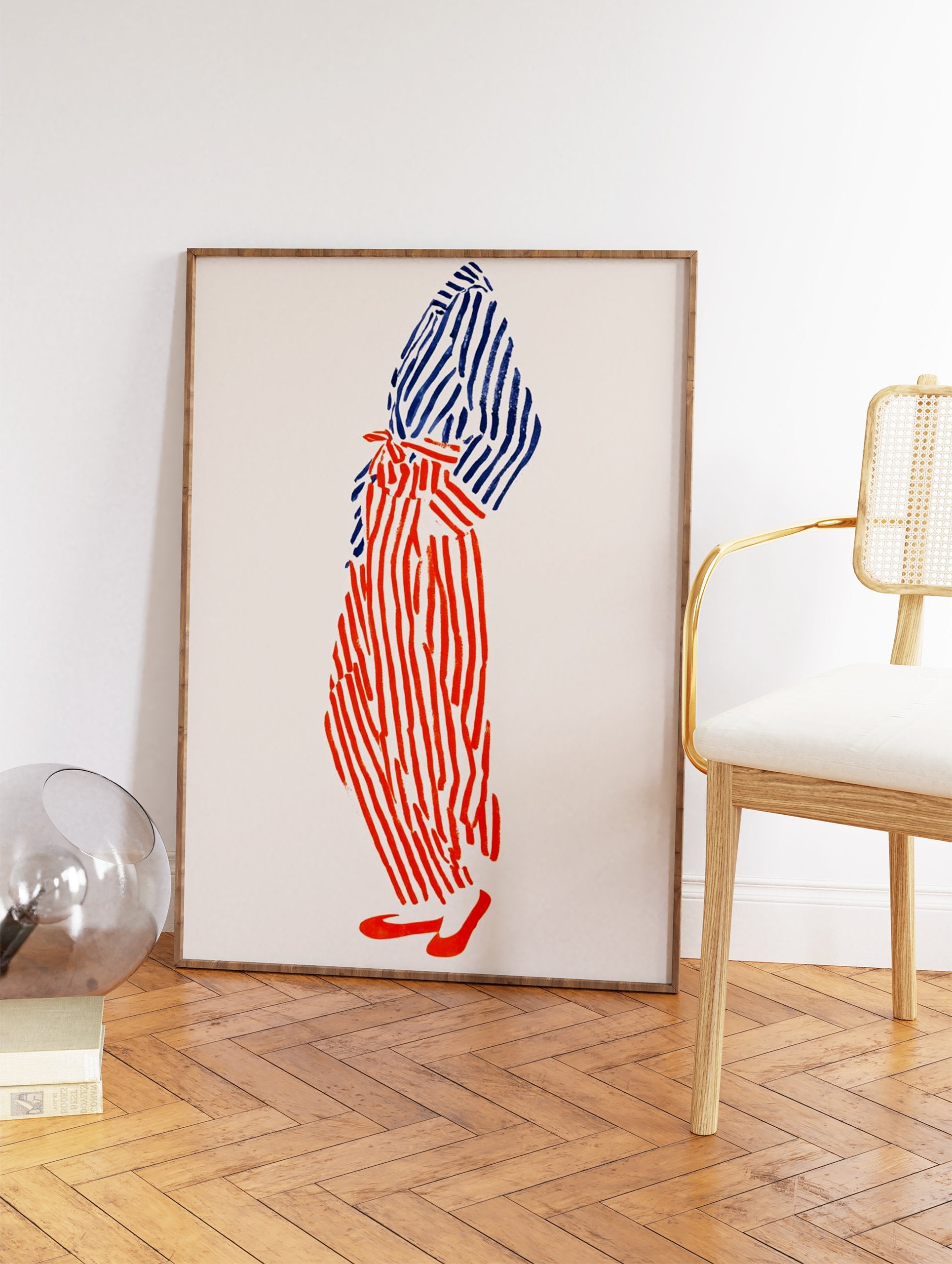 Abstract illustration of a person in bold red and blue striped clothing on a light background, modern wall art. - Image 2