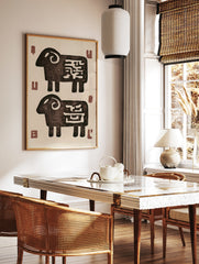 Stylised ram animal illustration with abstract markings on a cream background, in a styled room mockup