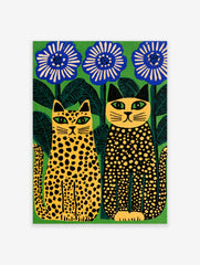 Stylised illustration of two spotted cats sitting beside large blue flowers against a vibrant green background art print