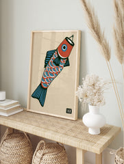 Stylised fish wall art illustration with red and blue scales on a beige background, in an alternate framed mockup