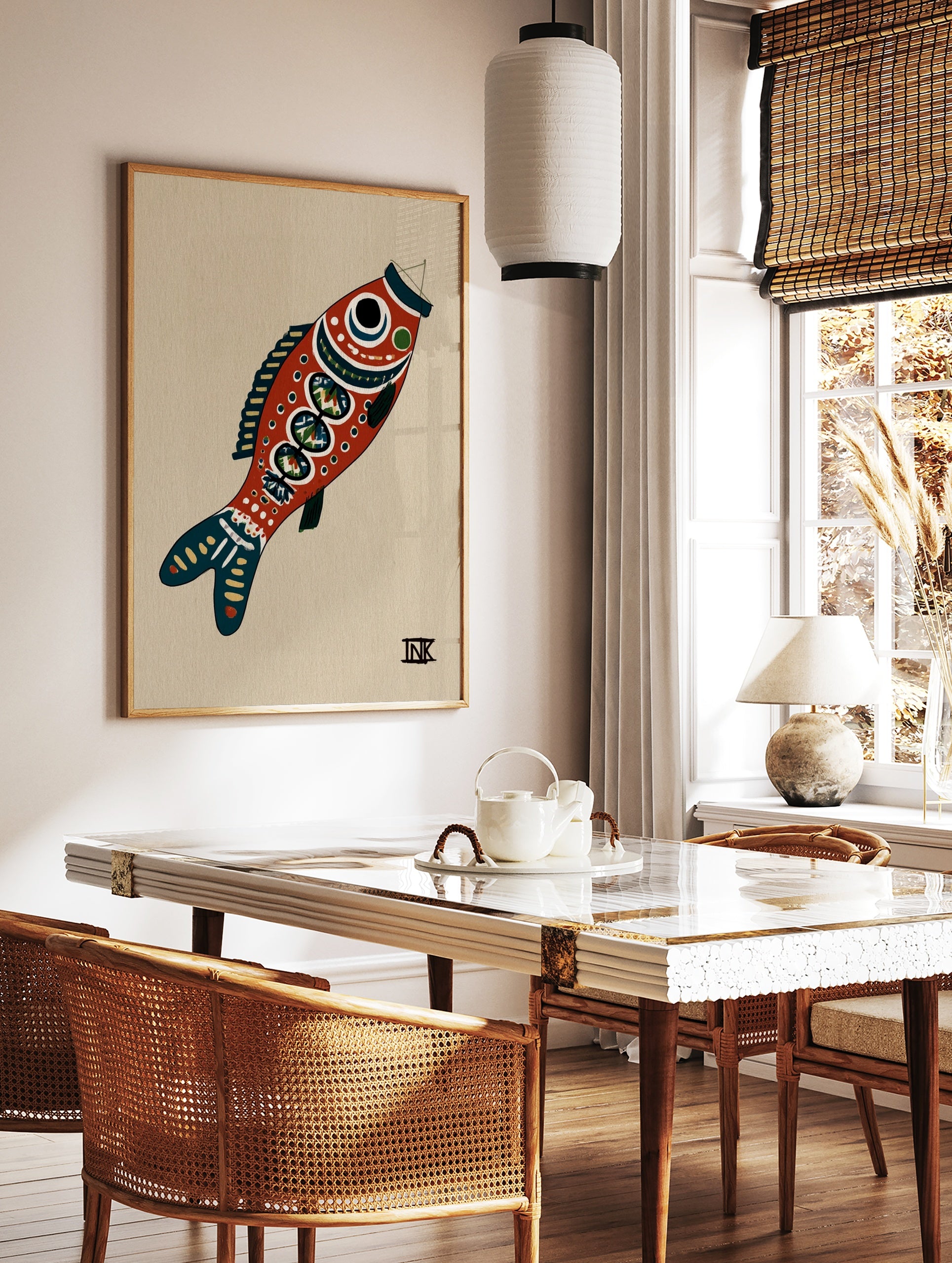 Stylised red fish illustrative art print with blue details on a tan background, in a styled room mockup