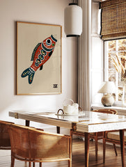 Stylised red fish illustrative art print with blue details on a tan background, in a styled room mockup