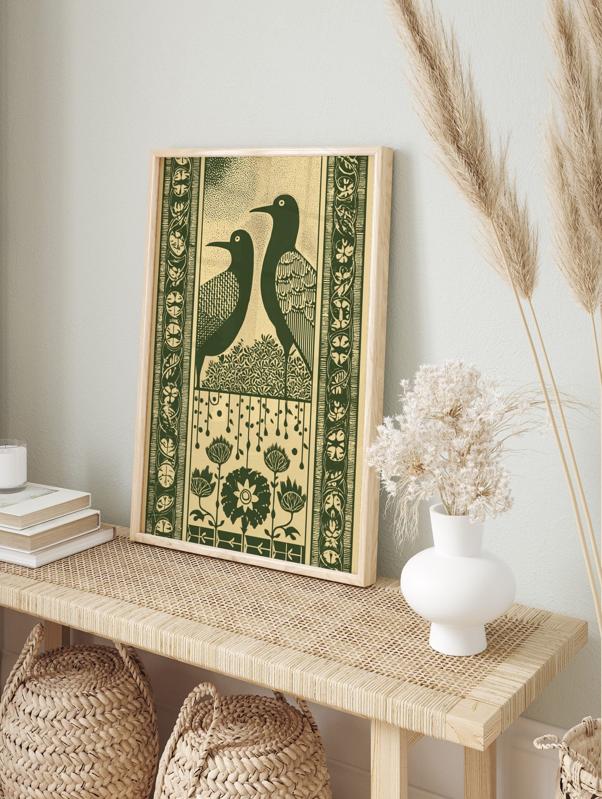 Art Nouveau style wall art print with two dark green stylised birds, leafy bush, decorative, in an alternate framed mockup
