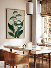 Stylised green plant botanical illustration with patterned caps and leaves on a light beige, in a styled room mockup
