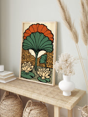 Stylised lotus flower art print with large green fan leaf, orange petals, and two water, in an alternate framed mockup