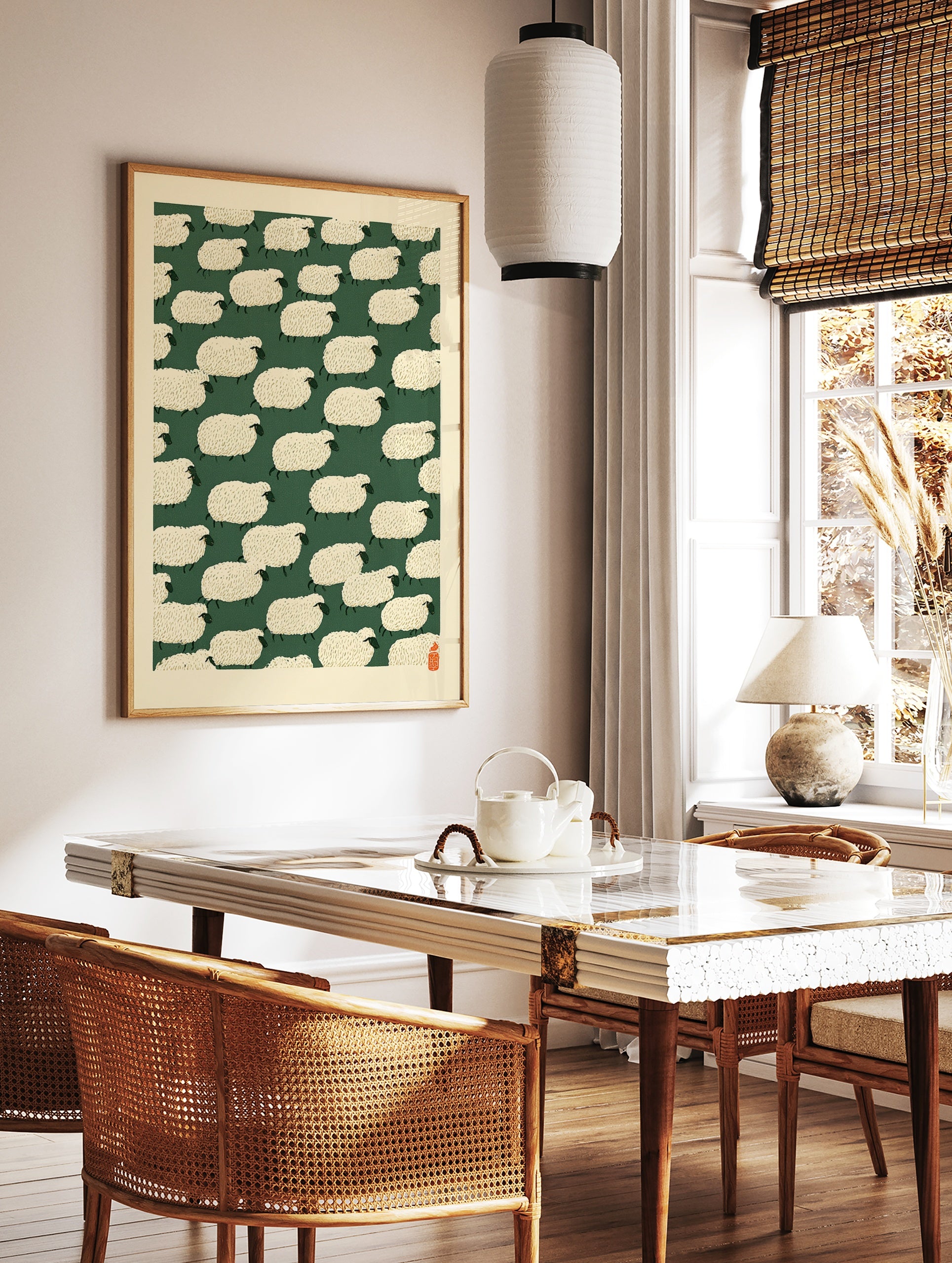 Repeating pattern of stylised cream sheep on a dark green background with a red seal in the corner, in a styled room mockup