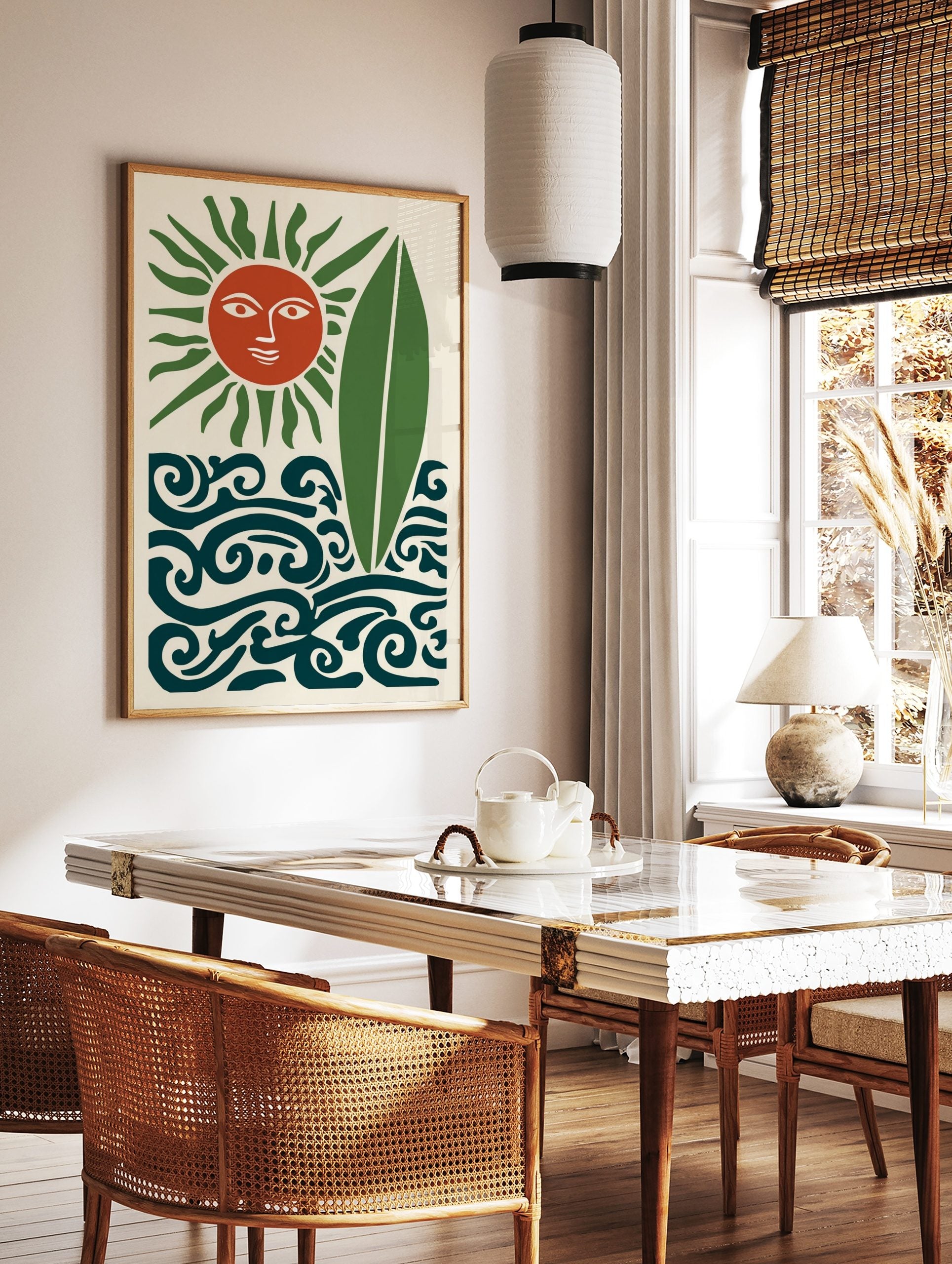 Stylised terracotta sun with green rays, green surfboard, and dark teal waves on a cream background, in a styled room mockup