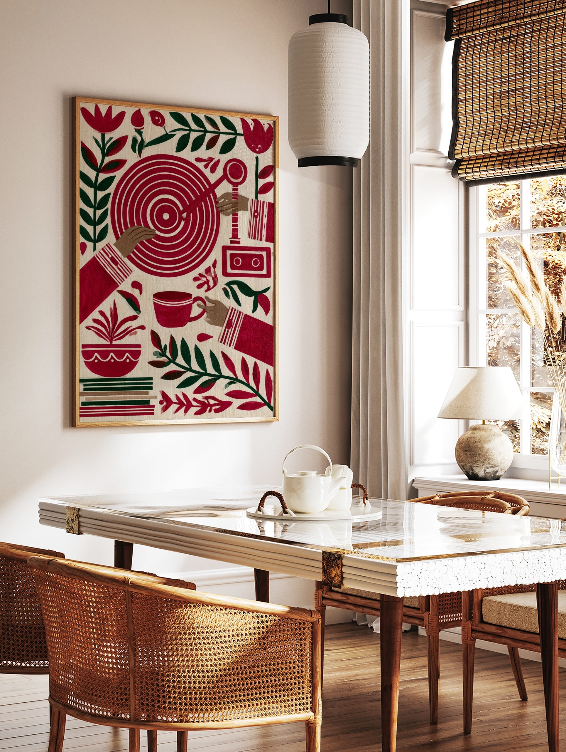 Stylized folk art print featuring hands, a red target, cassette recorder, teacup, and botanical, in a styled room mockup