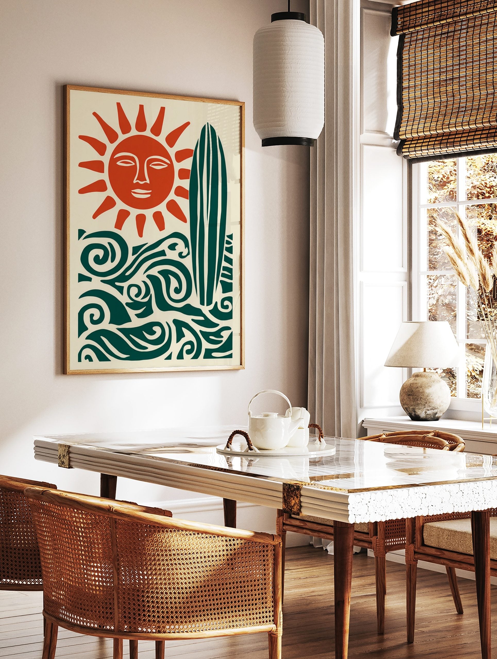 Illustrative sun with face, surfboard, and ocean waves in deep teal and burnt orange on cream, in a styled room mockup