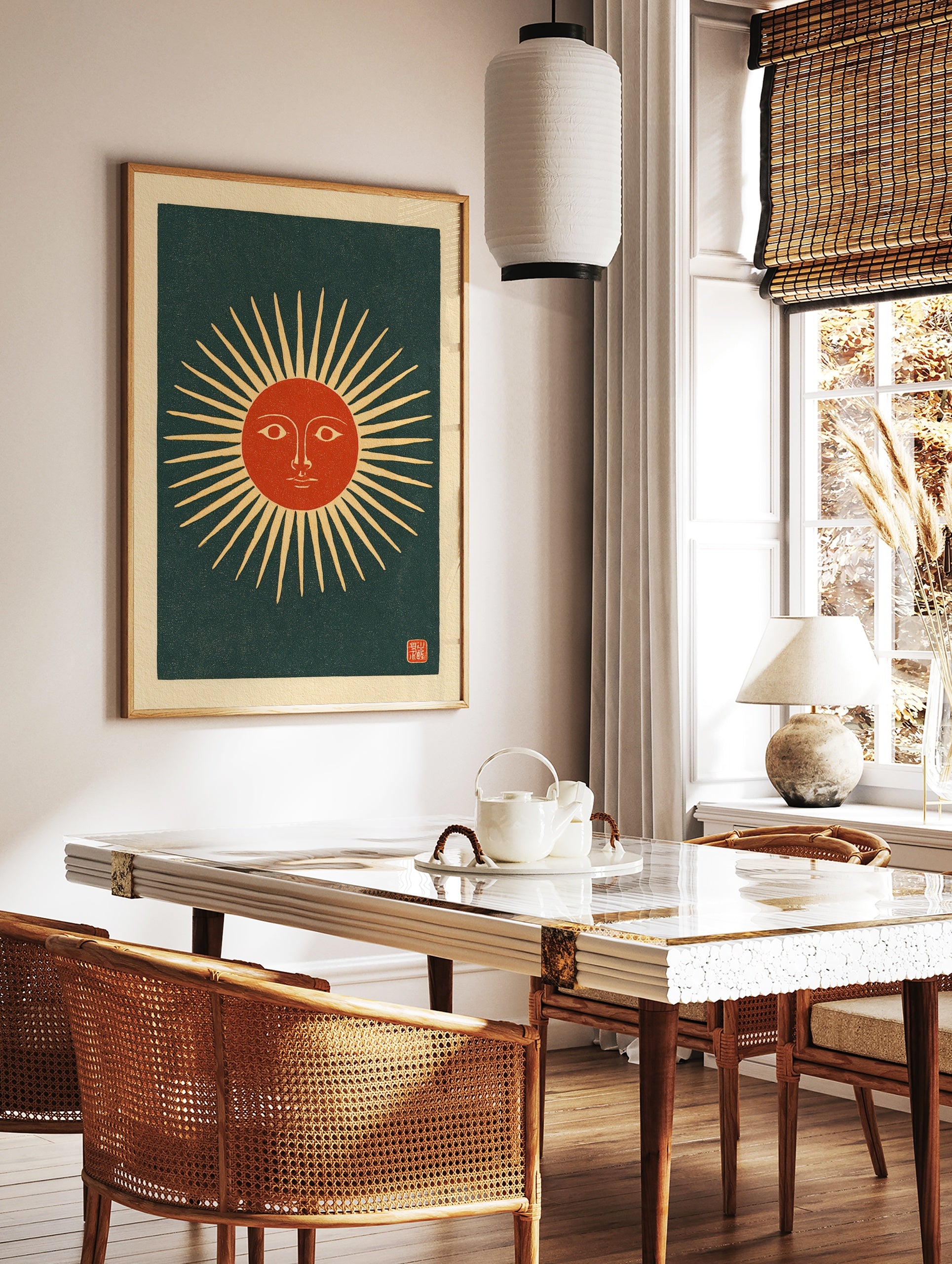 Stylised sun face with radiating beams and a red centre on a dark background, in a vintage, in a styled room mockup
