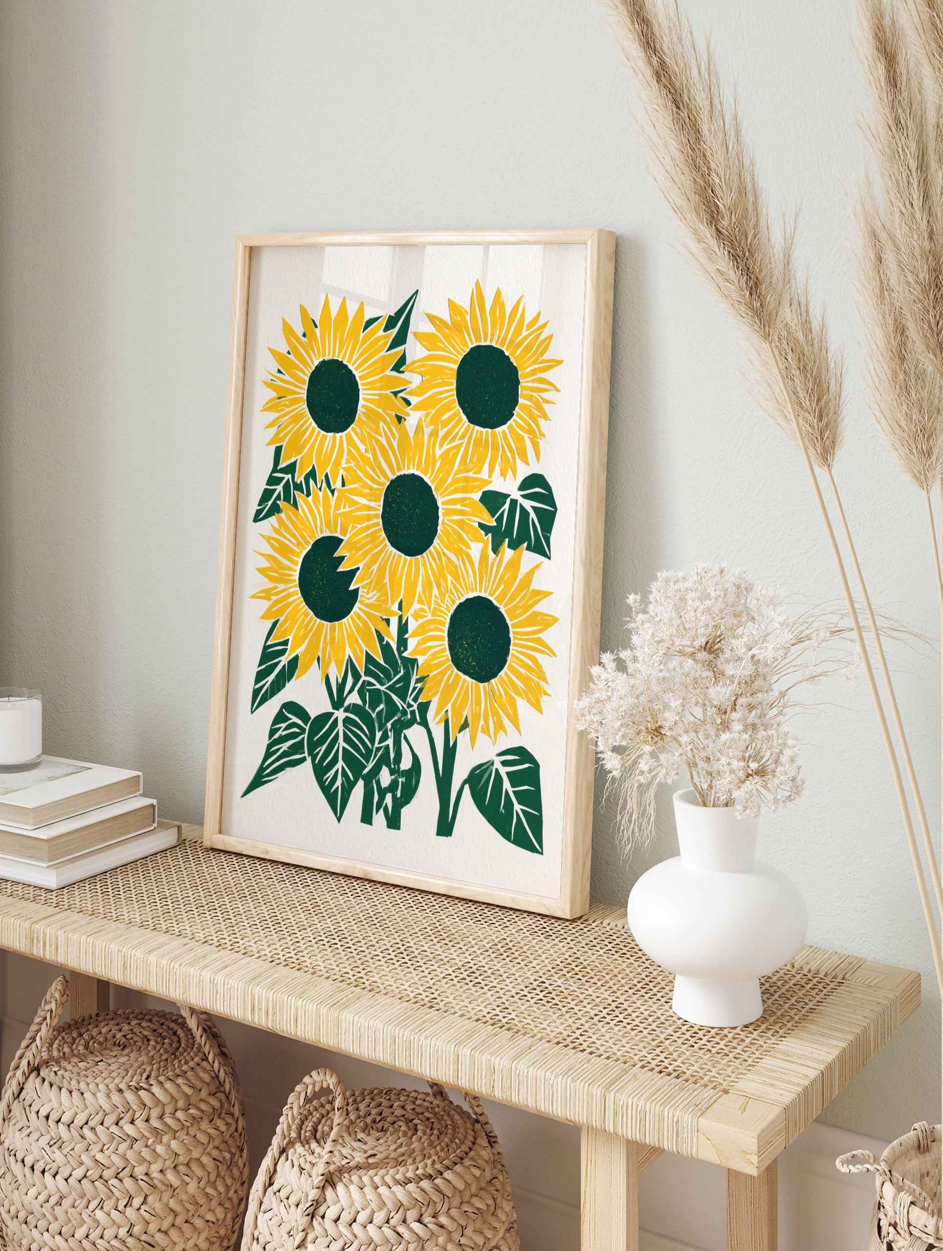 Five illustrative sunflowers with yellow petals and dark green centres on a white background, in an alternate framed mockup