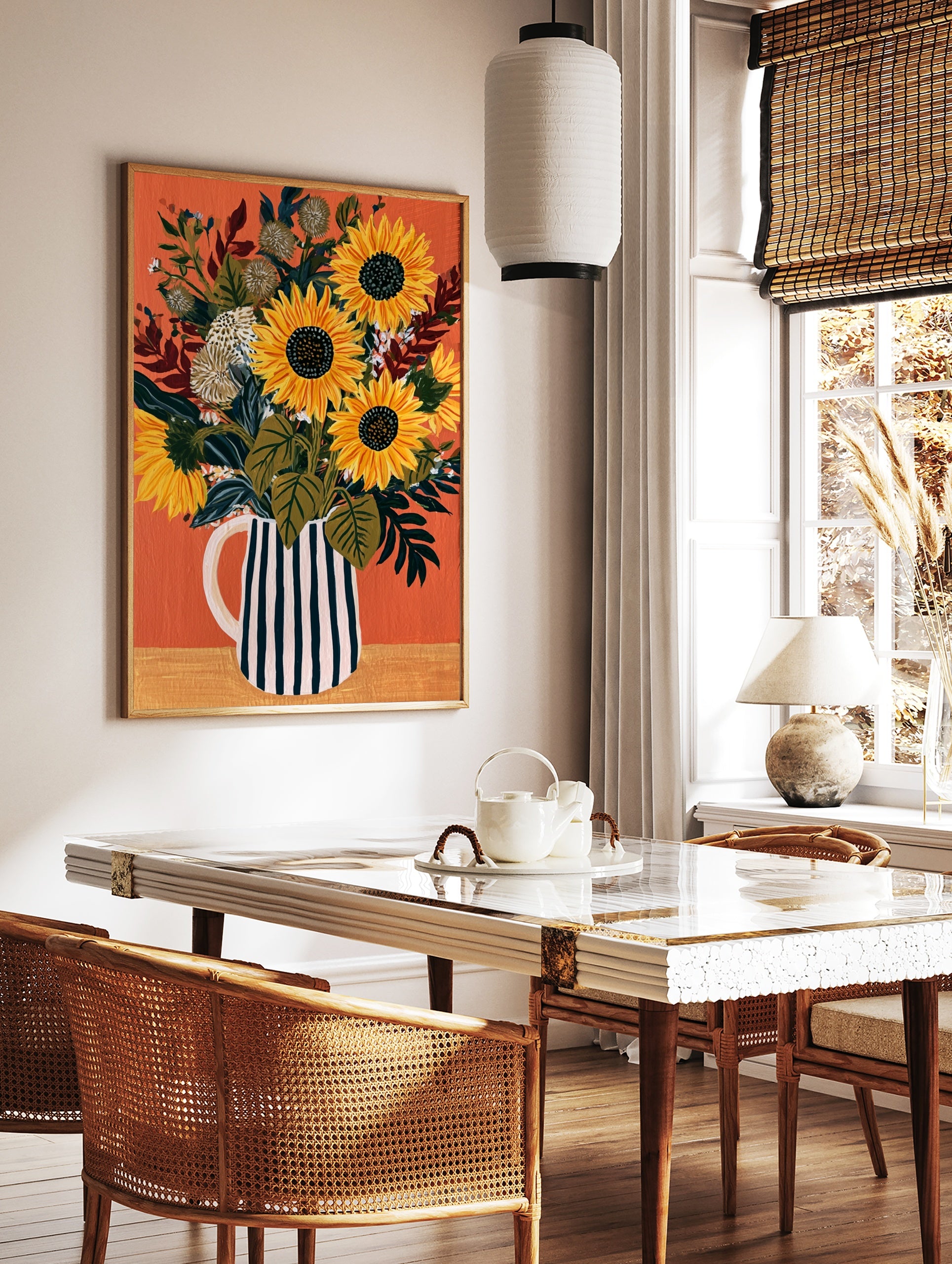 Sunflower bouquet in a black and white striped pitcher on an orange background, illustrative floral, in a styled room mockup