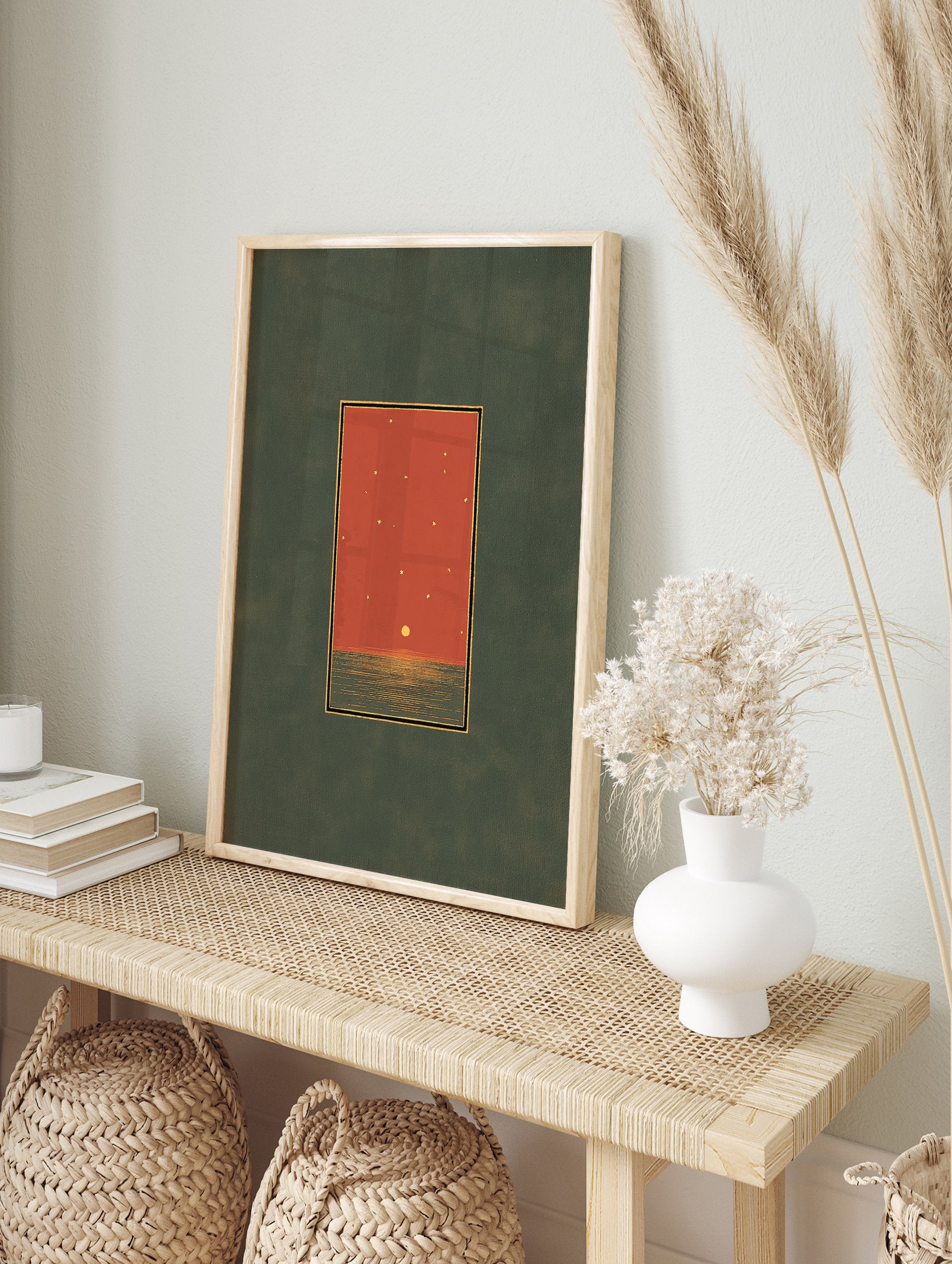 Minimalist sunset wall art print with a red sky, golden sun reflecting on dark green ocean, and stars, framed by gold and black lines. - Image 3