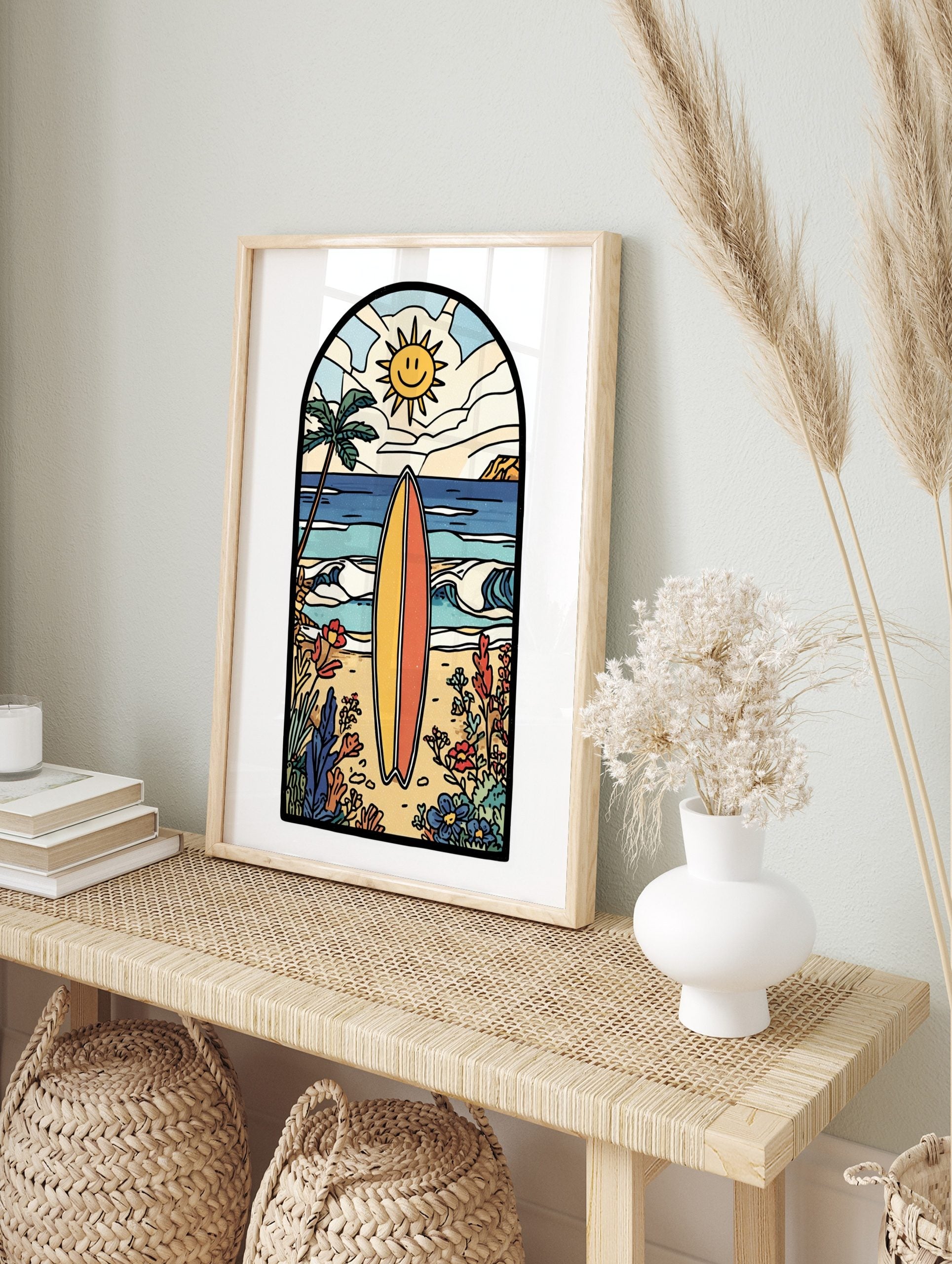 Illustrative beach scene art print with a yellow and orange surfboard, palm tree, smiling, in an alternate framed mockup