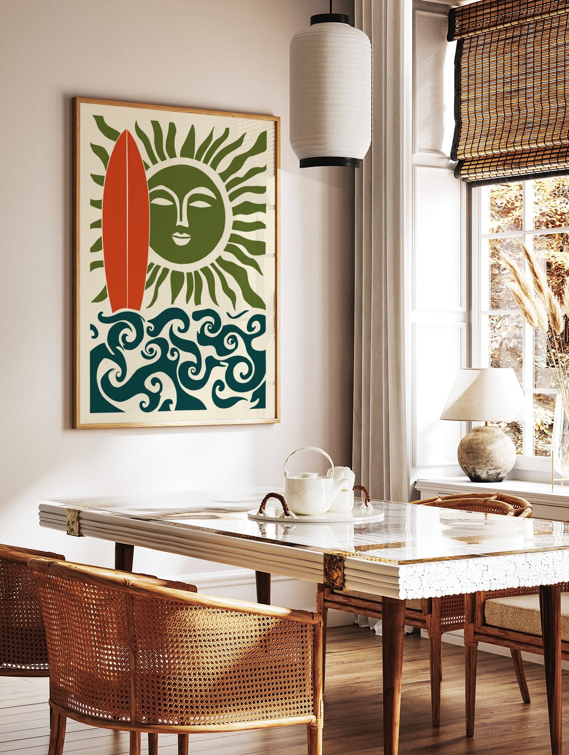 Illustrative wall art with red surfboard, green sun with face, and swirling blue ocean waves on, in a styled room mockup