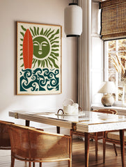 Illustrative wall art with red surfboard, green sun with face, and swirling blue ocean waves on, in a styled room mockup