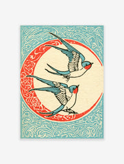 Vintage illustrative art print of two swallow birds flying inside a decorative circular frame on a blue patterned background