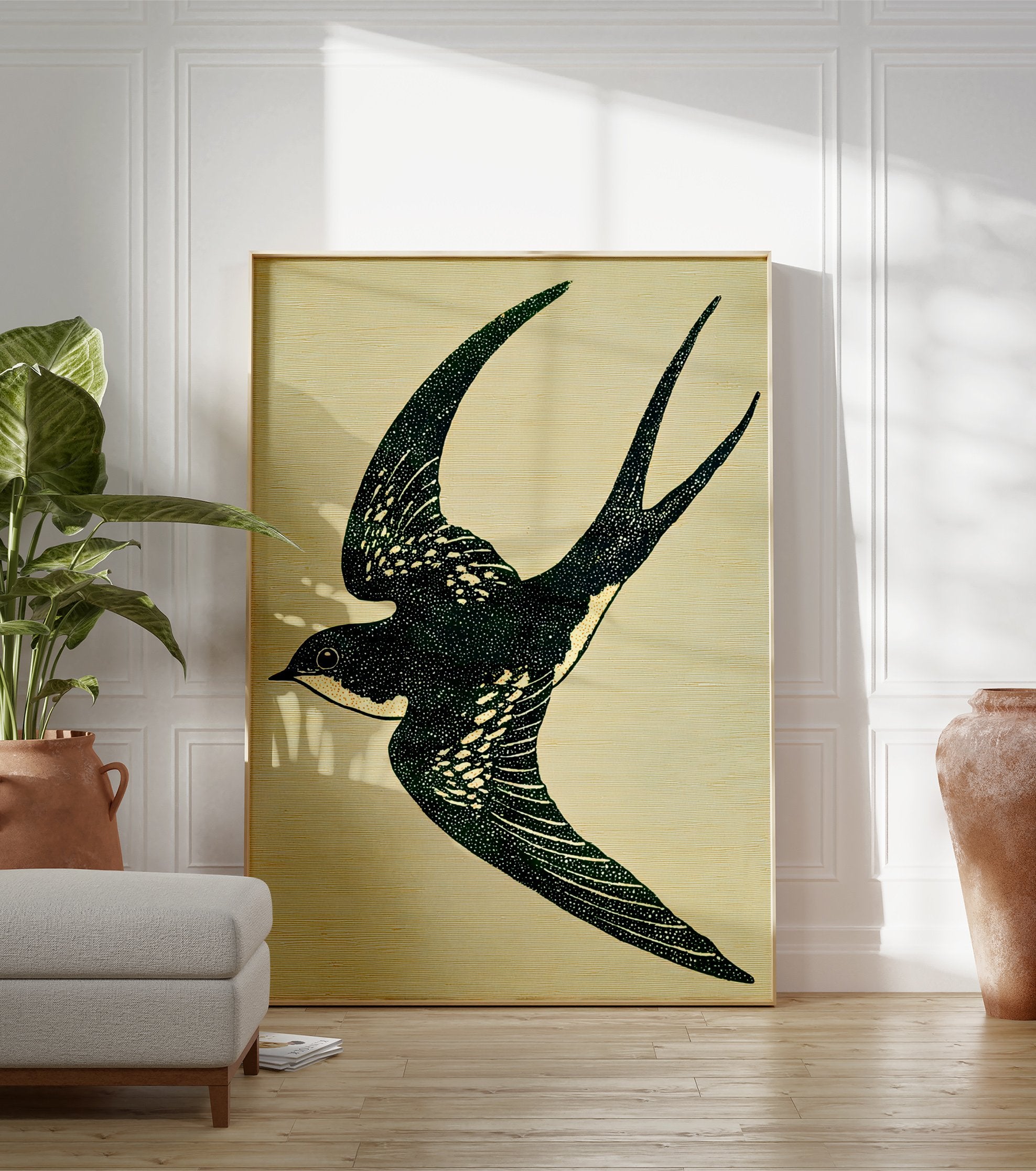 Illustrative art print of a dark green swallow bird in flight with white speckles against a light beige textured background. - Image 3