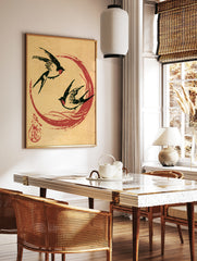 Two black swallows flying within a red circle on a tan paper background, Japanese-style art print, in a styled room mockup