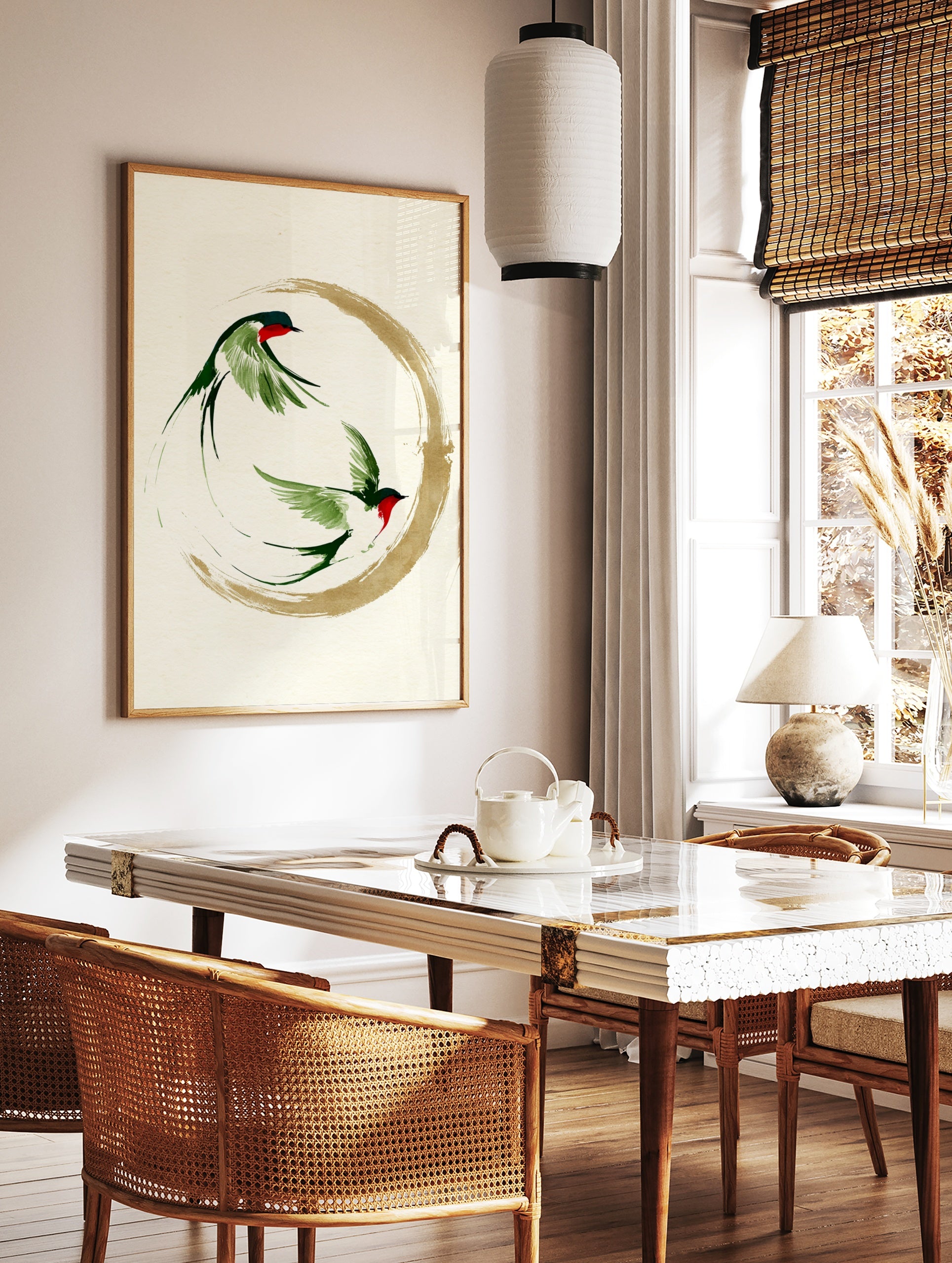 Two swallows in ink-wash style flying within a gold enso circle, Japanese minimalist art print on, in a styled room mockup