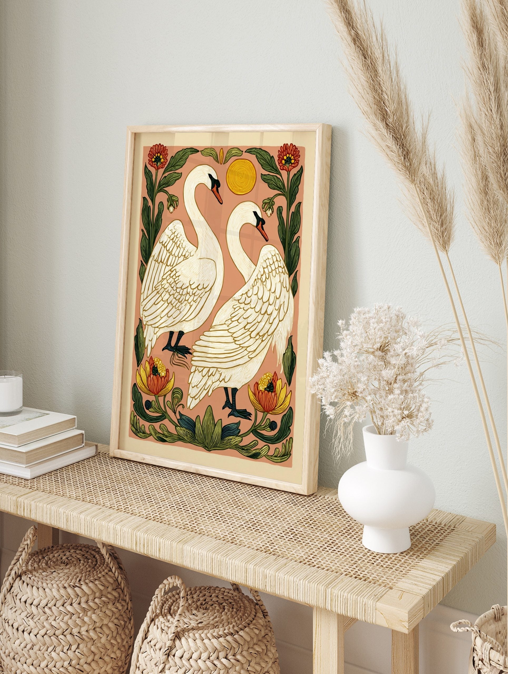 Illustrative art print of two white swans facing each other, surrounded by red and yellow, in an alternate framed mockup
