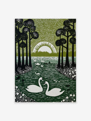 Linocut-style print of two white swans on a dark green lake, framed by tall black trees and a white rising sun