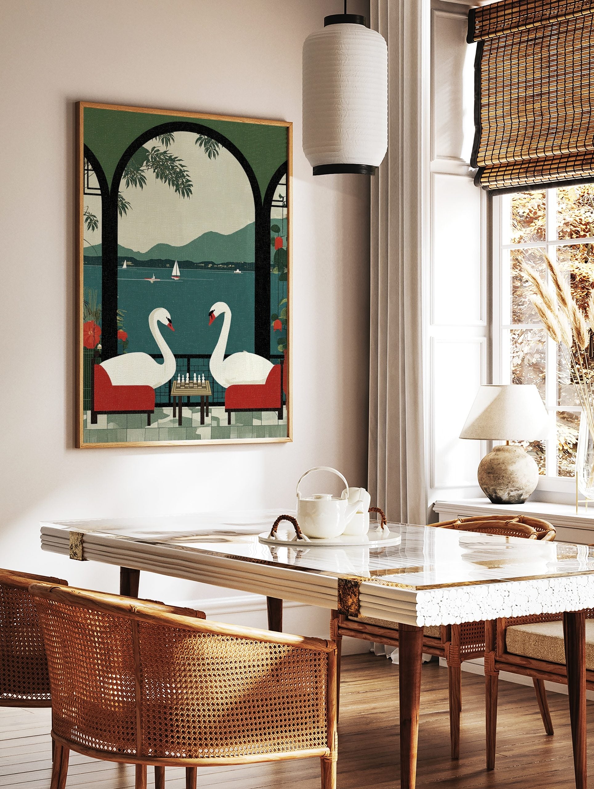 Illustrative print of two white swans playing chess in red chairs on a balcony overlooking a lake, in a styled room mockup