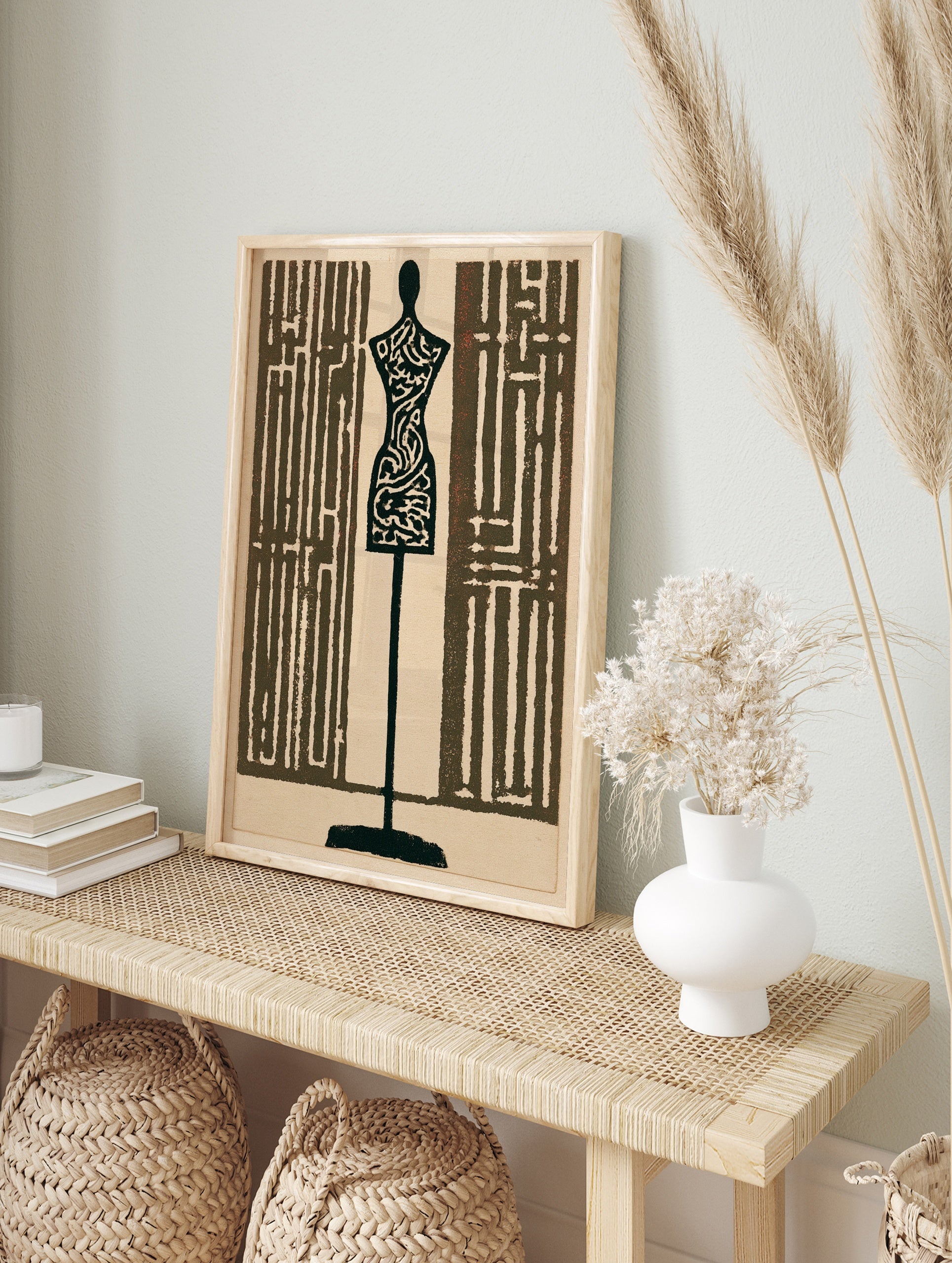 Tailor mannequin wall art with intricate maze patterns in dark brown and cream, graphic, in an alternate framed mockup