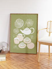 Illustration of a white tea set, peach tea cups, and mooncakes with white flowers on a sage green background. Tea Set & Mooncake Art. - Image 2