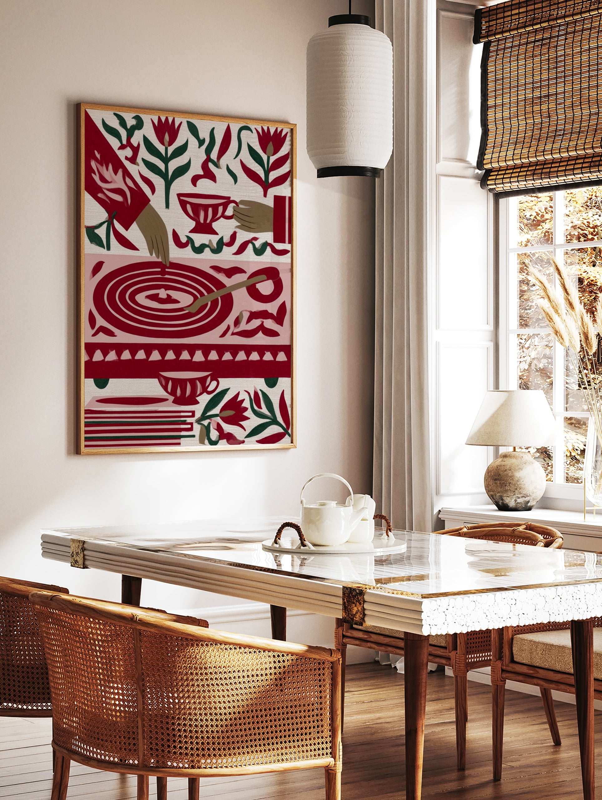 Illustrative tea time art print with red tulips, teacups, and a circular table motif on a cream, in a styled room mockup