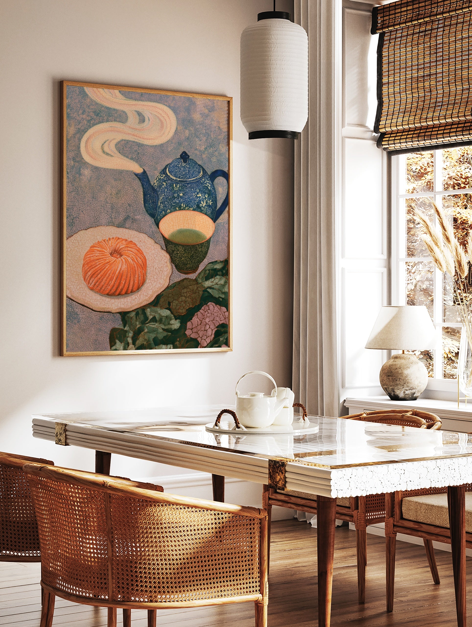 Still life art print with a blue teapot, green tea, and a swirled orange pastry on a textured, in a styled room mockup