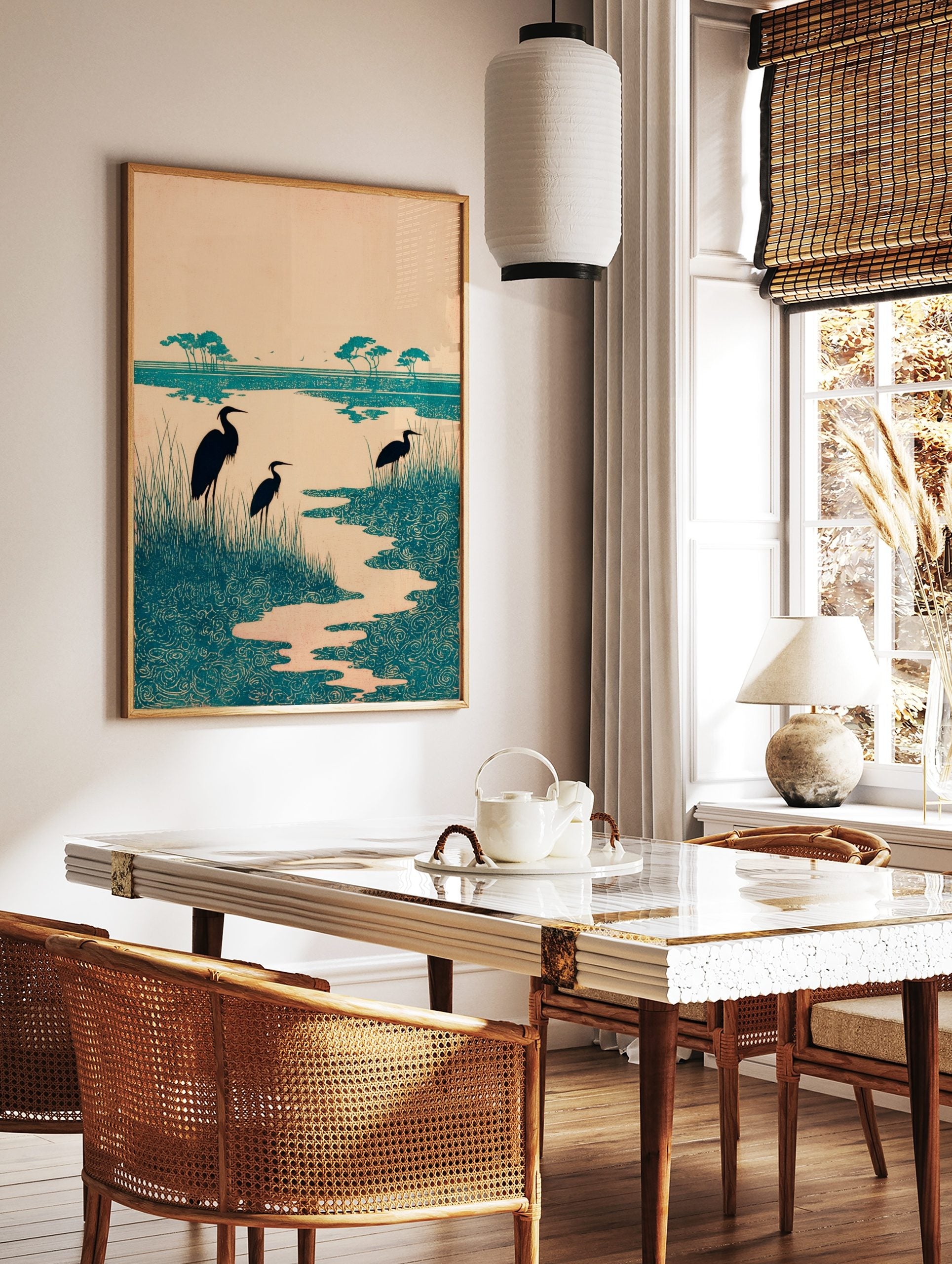 Teal heron wetland art print with three birds, tall grasses, and stylised swirling water patterns, in a styled room mockup