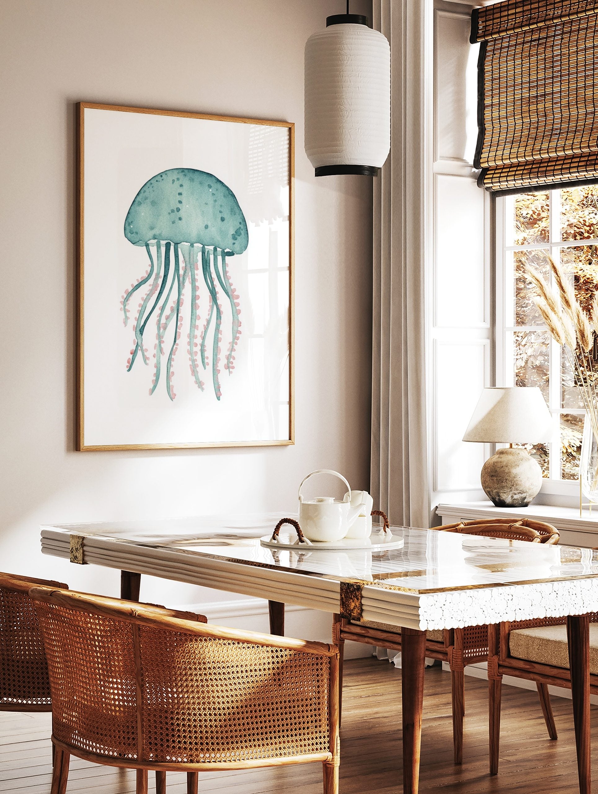 Teal watercolour jellyfish illustration art print with coral pink tentacles on a white background, in a styled room mockup