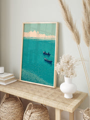 Japanese woodblock style art print of two boats on a teal lake with a reedy foreground and, in an alternate framed mockup