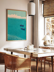 Japanese woodblock style art print of two boats on a teal lake with a reedy foreground and cloudy, in a styled room mockup