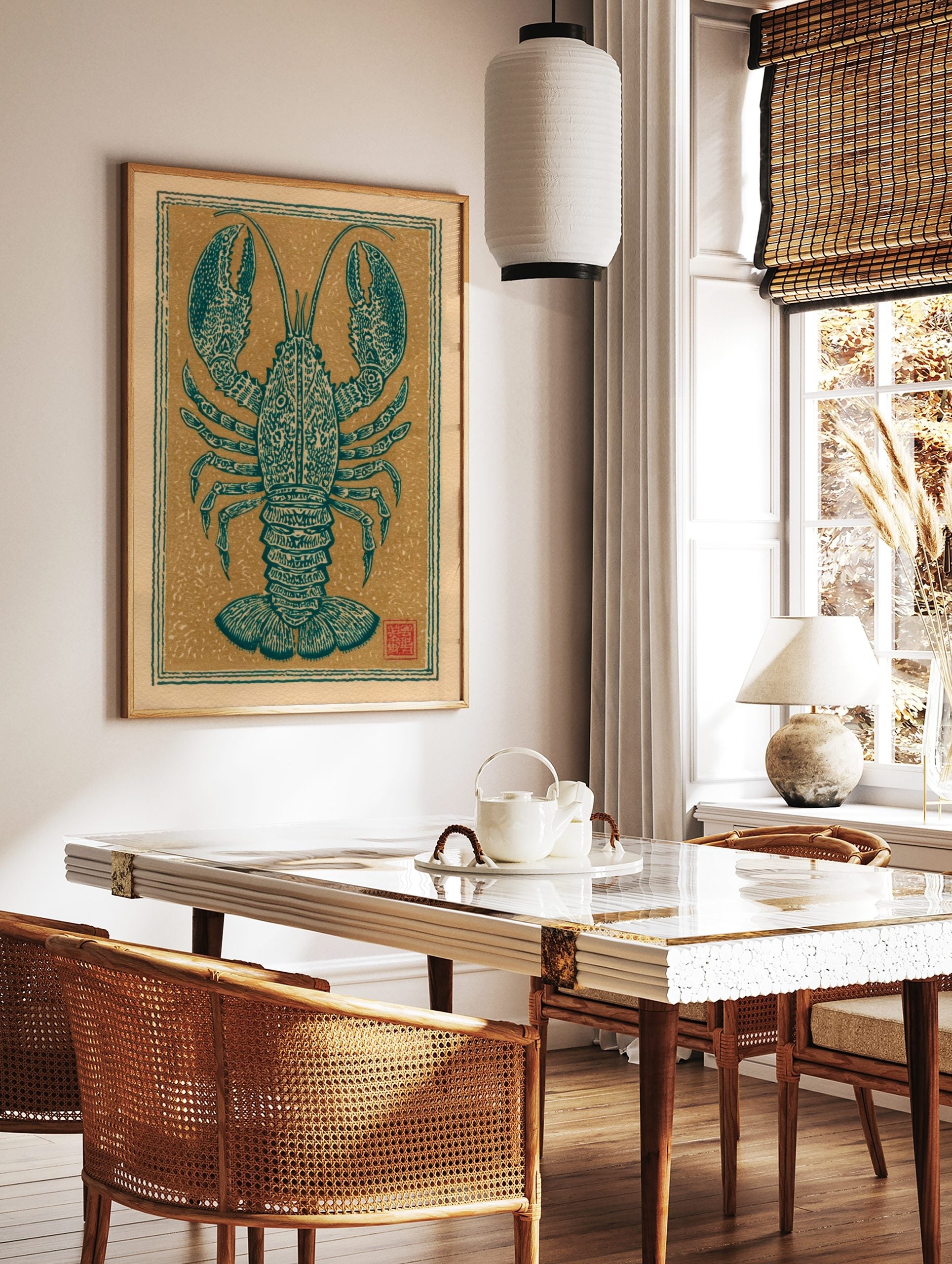 Teal lobster illustration with ornate patterns, centered on a beige background with a decorative, in a styled room mockup