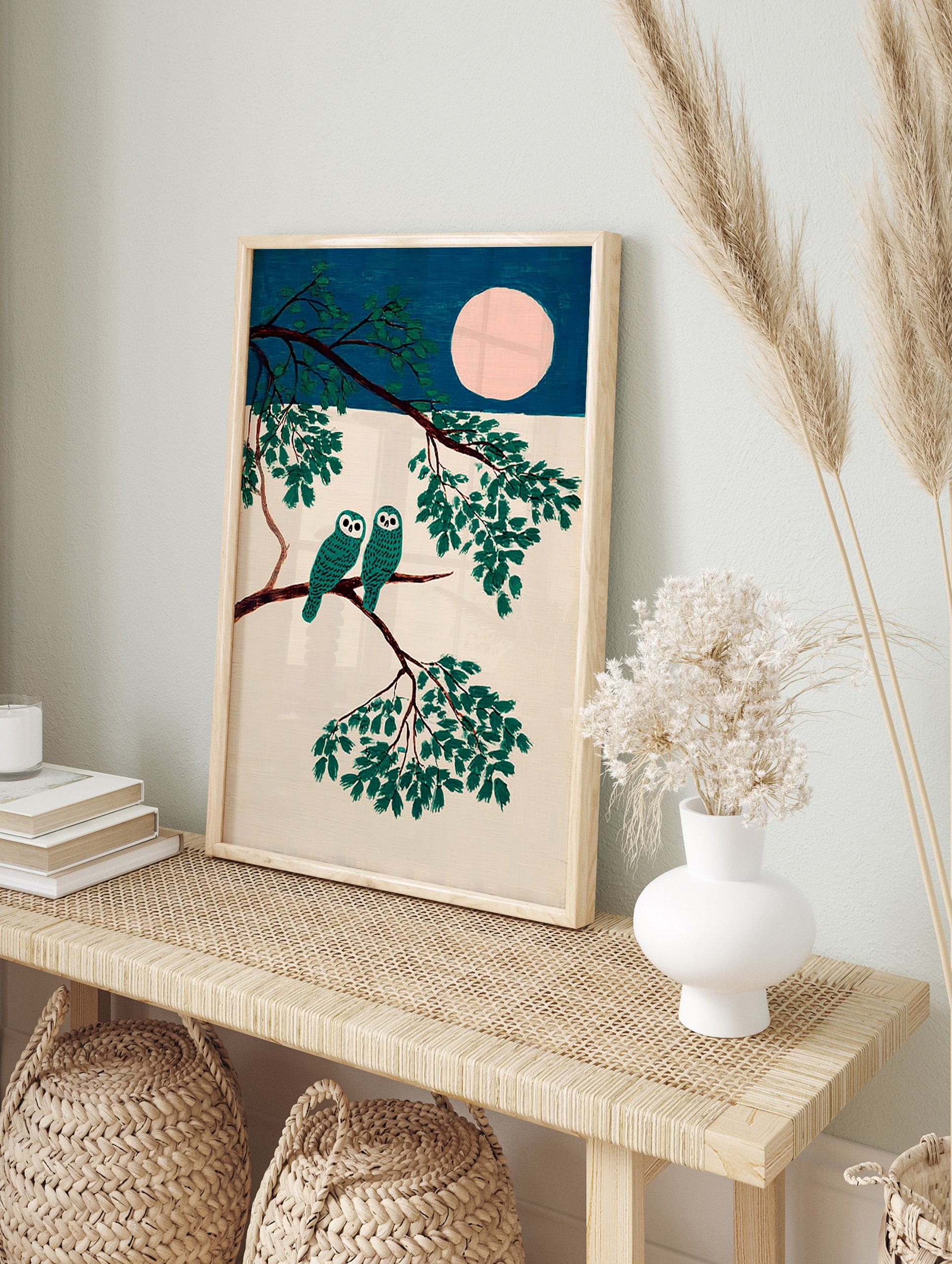 Teal owl wall art featuring two stylized owls on a tree branch under a pink full moon against a dark blue sky. - Image 3