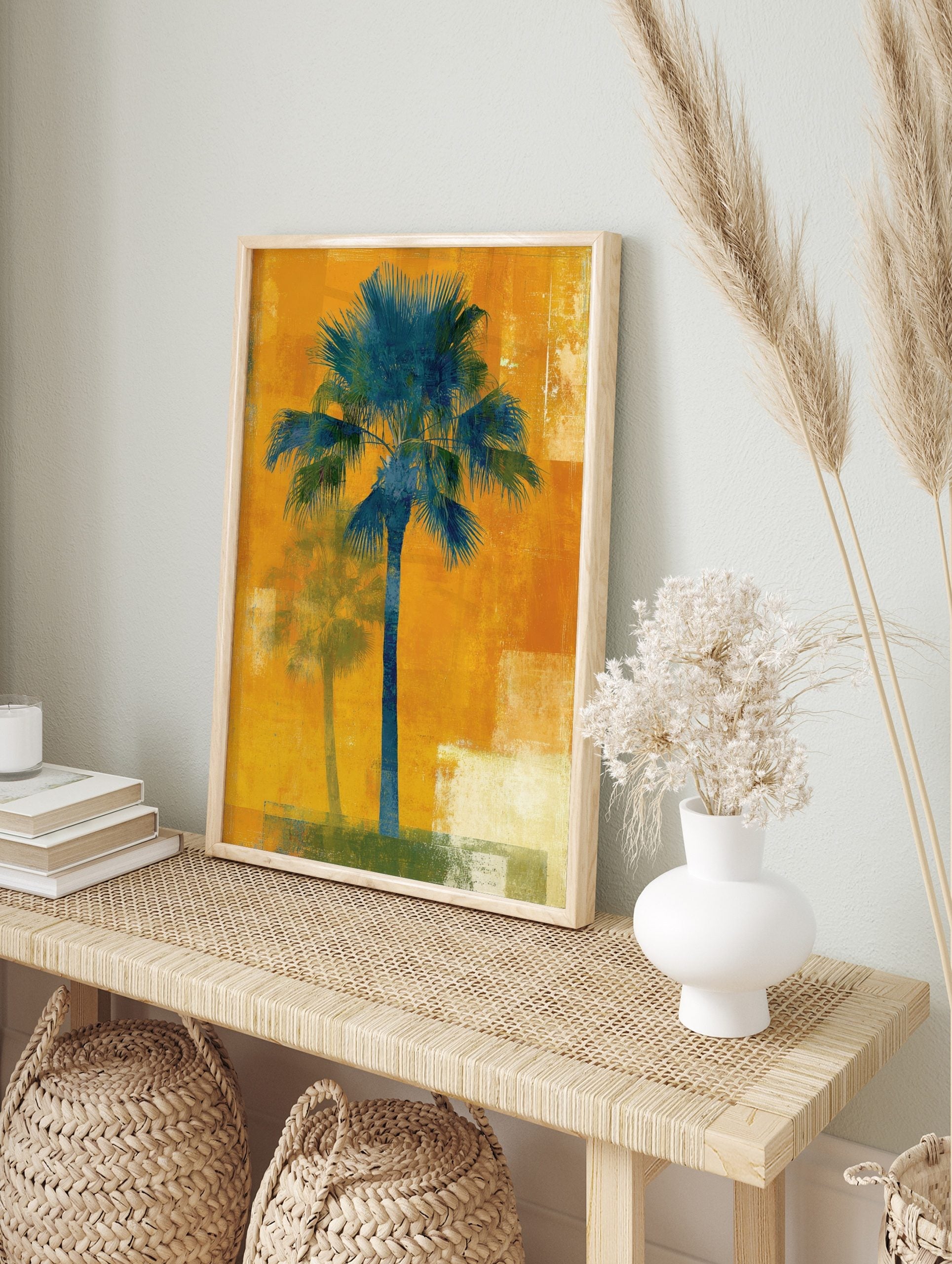 Teal palm tree art print on a textured orange background with a faded shadow palm, in an alternate framed mockup
